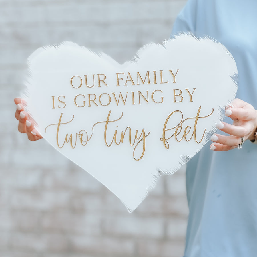 Our Family Is Growing By Two Tiny Feet Acrylic Sign