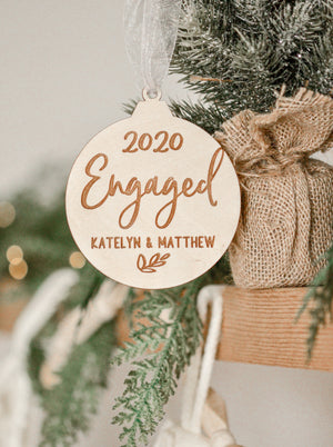 Our first Christmas Engaged wood ornament